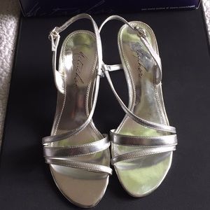 4 / $15 Metaphor Madison silver high heel shoes